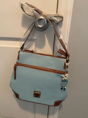 Light Blue Retro Messenger Bag with Bown Trim and added charm.